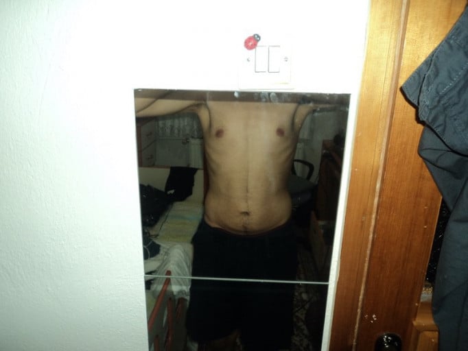A picture of a 5'7" male showing a weight loss from 211 pounds to 132 pounds. A net loss of 79 pounds.