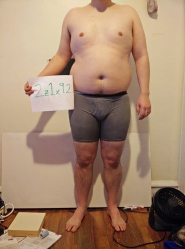 A progress pic of a 5'9" man showing a snapshot of 230 pounds at a height of 5'9