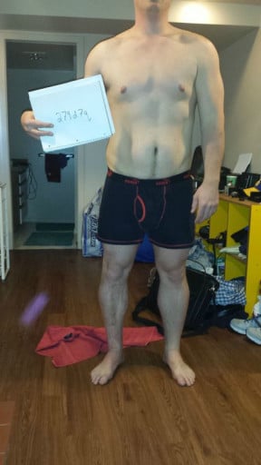 A picture of a 5'9" male showing a snapshot of 203 pounds at a height of 5'9
