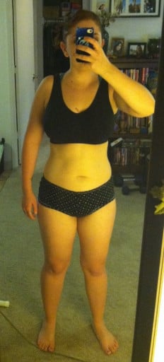 A picture of a 5'3" female showing a weight reduction from 162 pounds to 142 pounds. A net loss of 20 pounds.