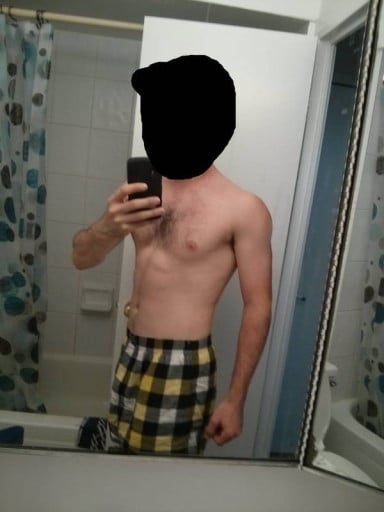 A progress pic of a 5'11" man showing a weight gain from 147 pounds to 165 pounds. A total gain of 18 pounds.