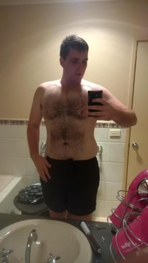 A picture of a 6'4" male showing a weight cut from 273 pounds to 257 pounds. A net loss of 16 pounds.