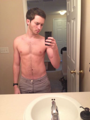 A progress pic of a 5'8" man showing a weight cut from 165 pounds to 143 pounds. A net loss of 22 pounds.