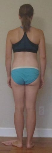 A photo of a 5'2" woman showing a snapshot of 122 pounds at a height of 5'2