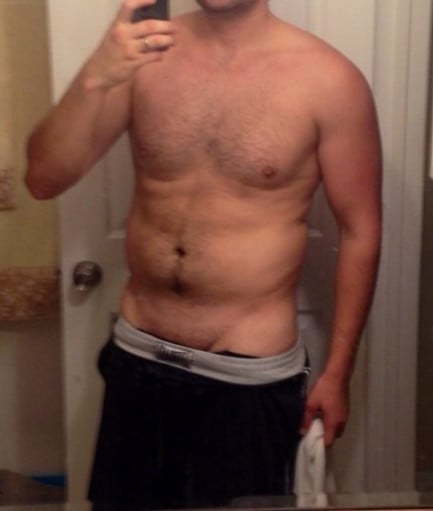 A picture of a 5'11" male showing a weight reduction from 202 pounds to 181 pounds. A total loss of 21 pounds.