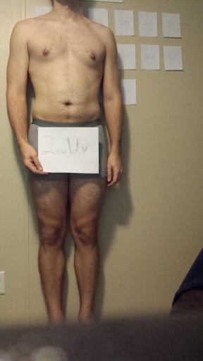 A picture of a 6'4" male showing a snapshot of 221 pounds at a height of 6'4