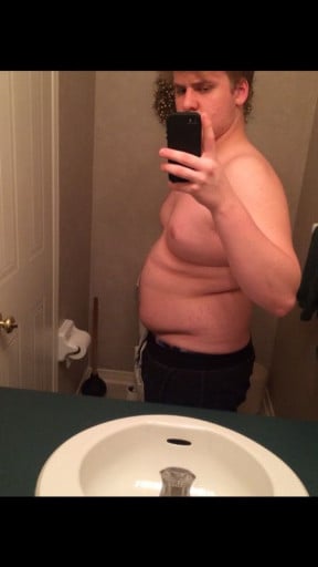 A picture of a 5'10" male showing a fat loss from 230 pounds to 187 pounds. A net loss of 43 pounds.