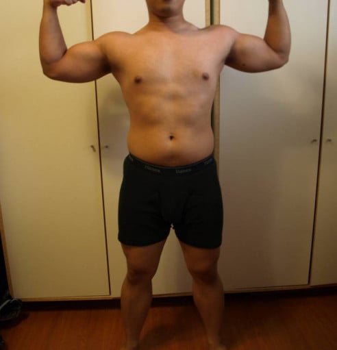 A progress pic of a 5'4" man showing a snapshot of 155 pounds at a height of 5'4