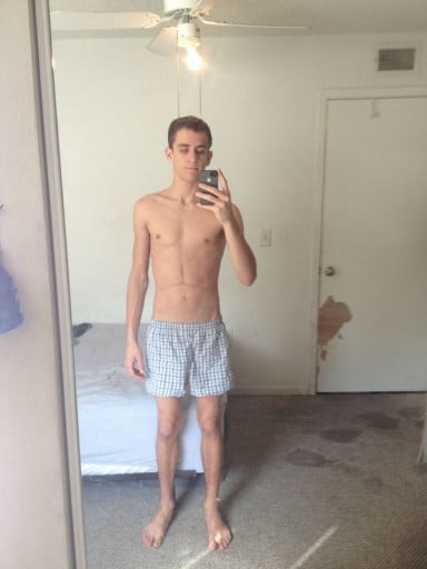 A picture of a 5'11" male showing a snapshot of 132 pounds at a height of 5'11