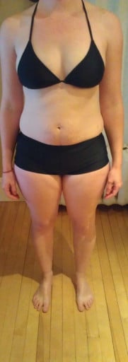 A photo of a 5'5" woman showing a snapshot of 148 pounds at a height of 5'5