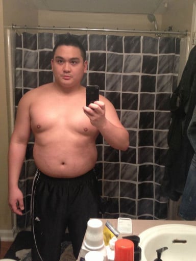 A photo of a 5'7" man showing a weight cut from 230 pounds to 176 pounds. A net loss of 54 pounds.