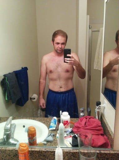 A photo of a 5'8" man showing a weight cut from 215 pounds to 165 pounds. A total loss of 50 pounds.