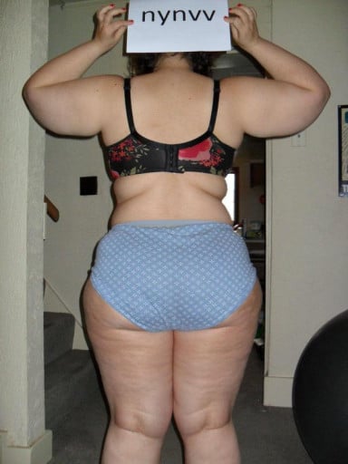 A progress pic of a 5'3" woman showing a snapshot of 232 pounds at a height of 5'3