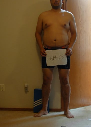 A photo of a 6'0" man showing a snapshot of 221 pounds at a height of 6'0