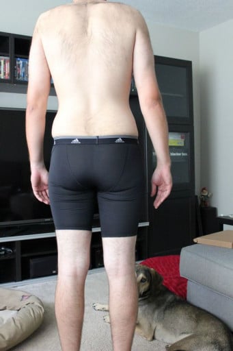 A photo of a 6'2" man showing a snapshot of 187 pounds at a height of 6'2