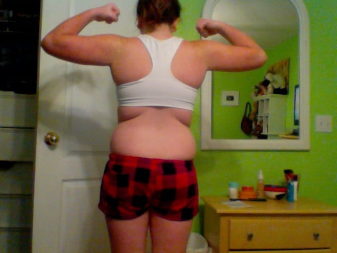 A picture of a 5'3" female showing a weight cut from 153 pounds to 125 pounds. A total loss of 28 pounds.