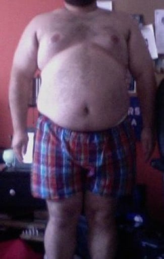 A progress pic of a 5'5" man showing a snapshot of 245 pounds at a height of 5'5