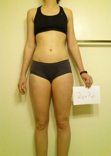 A progress pic of a 5'11" woman showing a snapshot of 140 pounds at a height of 5'11
