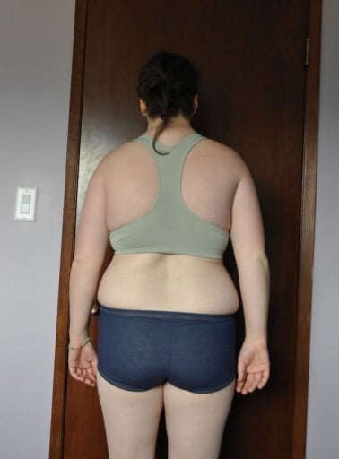 A photo of a 5'6" woman showing a fat loss from 185 pounds to 180 pounds. A total loss of 5 pounds.