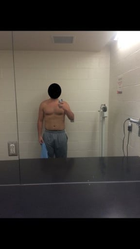 A picture of a 6'0" male showing a fat loss from 270 pounds to 218 pounds. A total loss of 52 pounds.