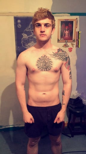 A progress pic of a 5'11" man showing a snapshot of 166 pounds at a height of 5'11