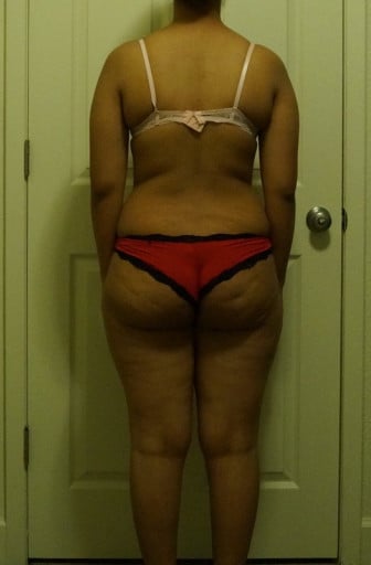 A photo of a 5'4" woman showing a snapshot of 157 pounds at a height of 5'4