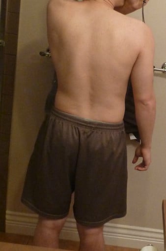 A progress pic of a 5'5" man showing a snapshot of 153 pounds at a height of 5'5