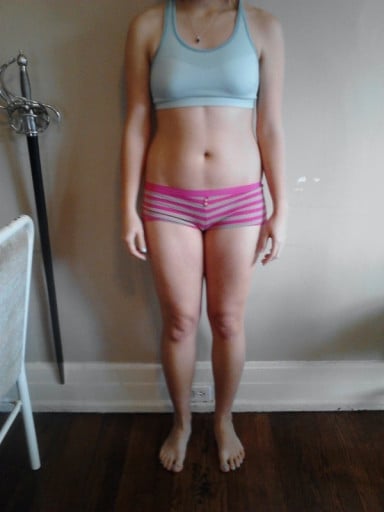 A photo of a 5'7" woman showing a fat loss from 154 pounds to 152 pounds. A respectable loss of 2 pounds.