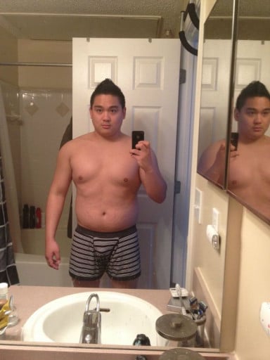 A photo of a 5'7" man showing a weight cut from 230 pounds to 176 pounds. A net loss of 54 pounds.