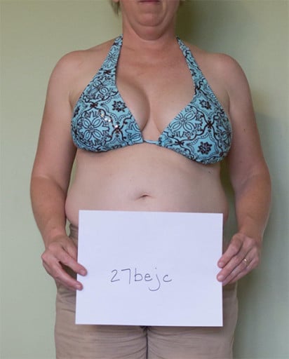 A progress pic of a 5'2" woman showing a snapshot of 147 pounds at a height of 5'2