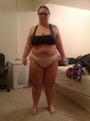 A picture of a 5'2" female showing a fat loss from 243 pounds to 121 pounds. A total loss of 122 pounds.