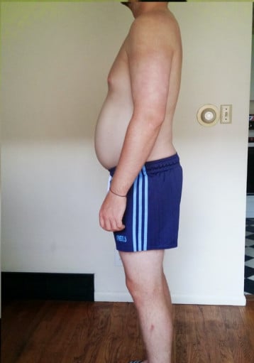 A progress pic of a person at 228 lbs